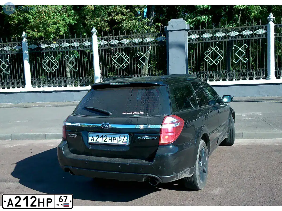 Фото автомобиля SUBARU OUTBACK, 2007 — госномер О673АС32. Цвет: ЧЕРНЫЙ