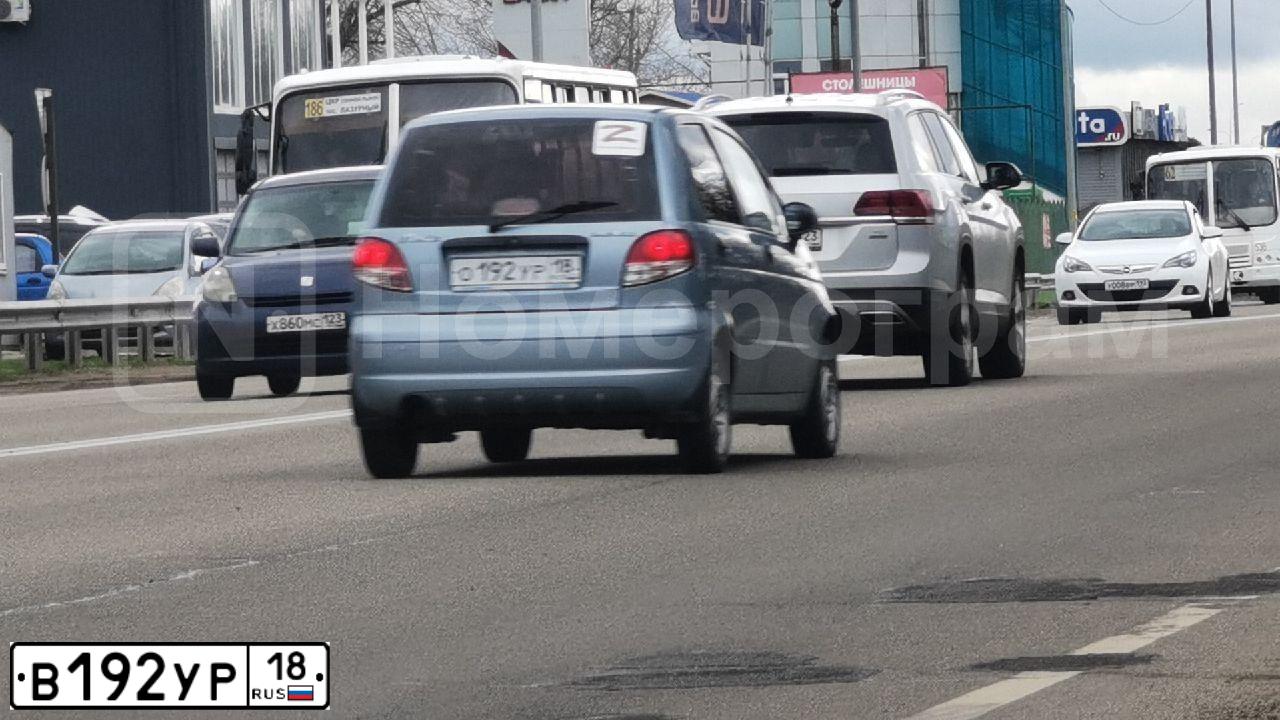 Фото автомобиля VOLKSWAGEN TIGUAN, 2011 — госномер В192УР18. Цвет: ЧЕРНЫЙ
