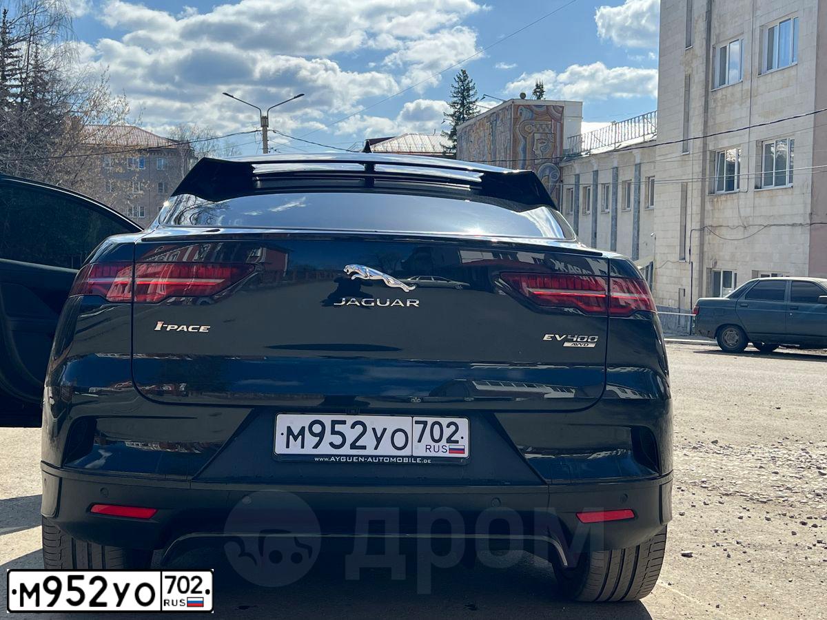 Фото автомобиля JAGUAR I-PACE, 2020 — госномер М952УО702. Цвет: ЧЕРНЫЙ