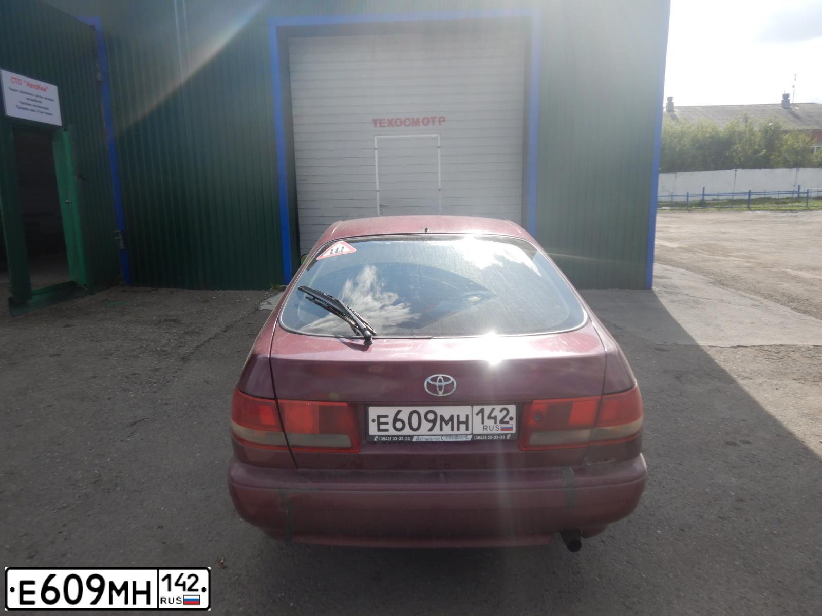 Фото автомобиля TOYOTA CARINA, 1995 — госномер Е609МН142. Цвет: ТЕМНО-КРАСНЫЙ