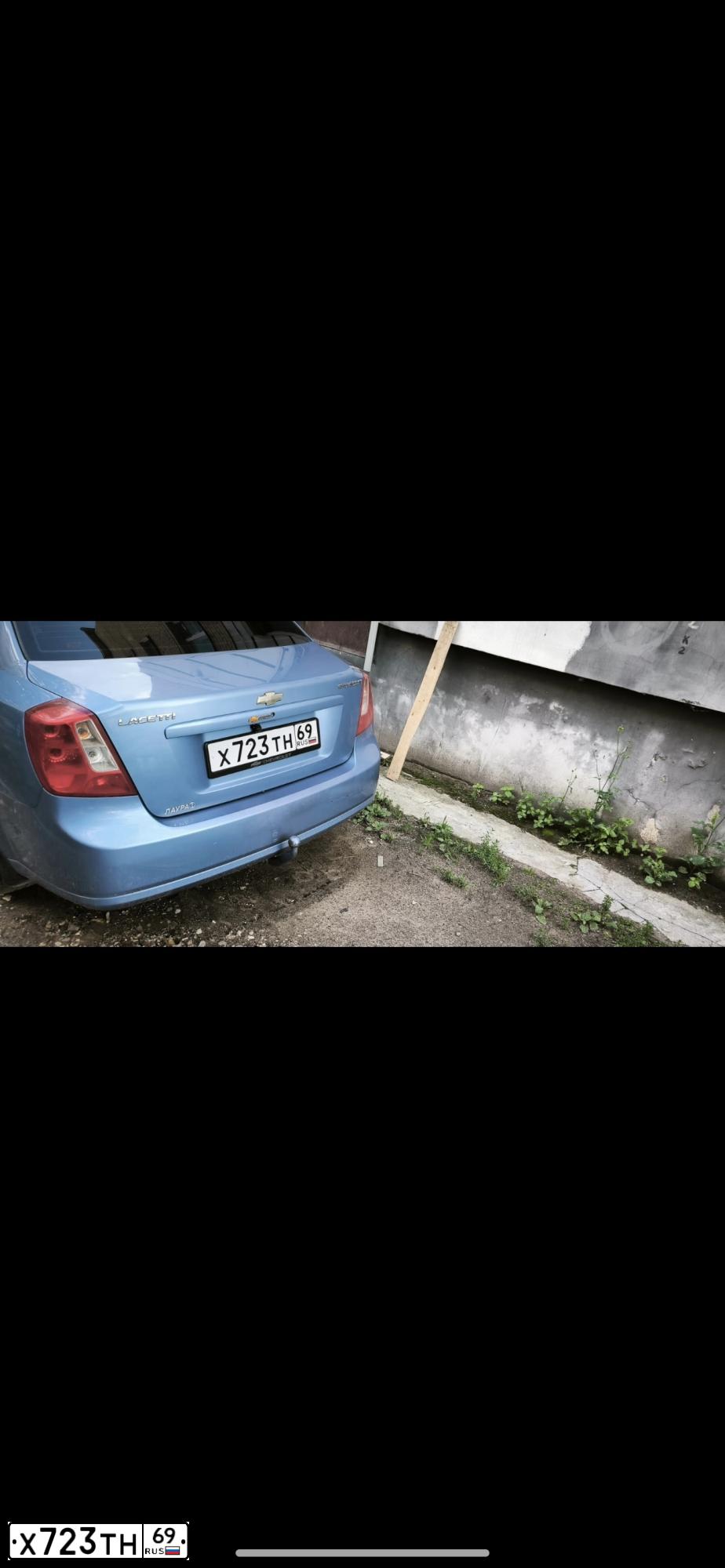 Фото автомобиля CHEVROLET LACETTI, 2005 — госномер Х723ТН69. Цвет: синий