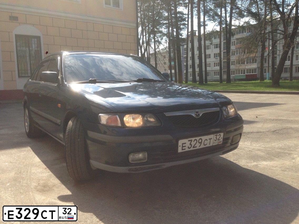 Фото автомобиля MAZDA 626, 1997 — госномер Х696СТ71. Цвет: синий