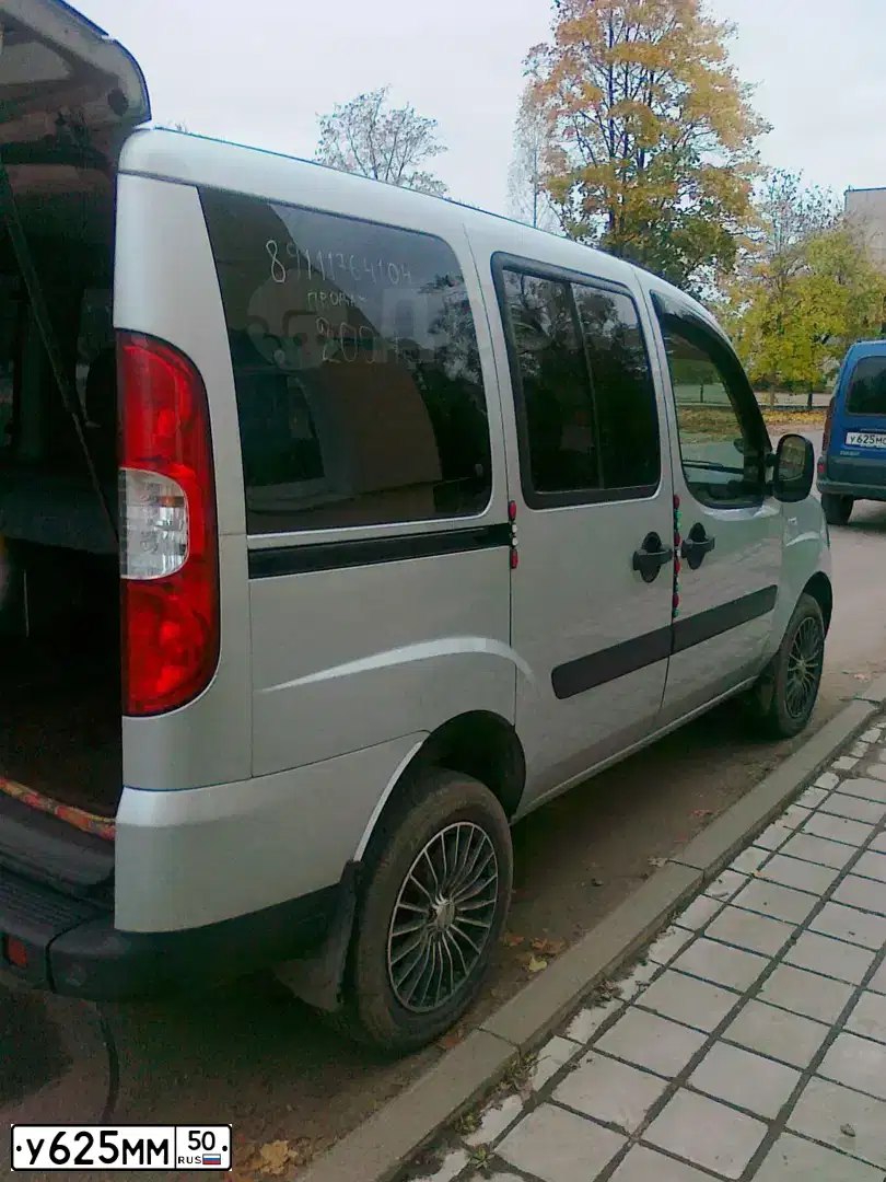 Фото автомобиля ГАЗ 32214, 2003 — госномер К324ММ50. Цвет: БЕЛЫЙ