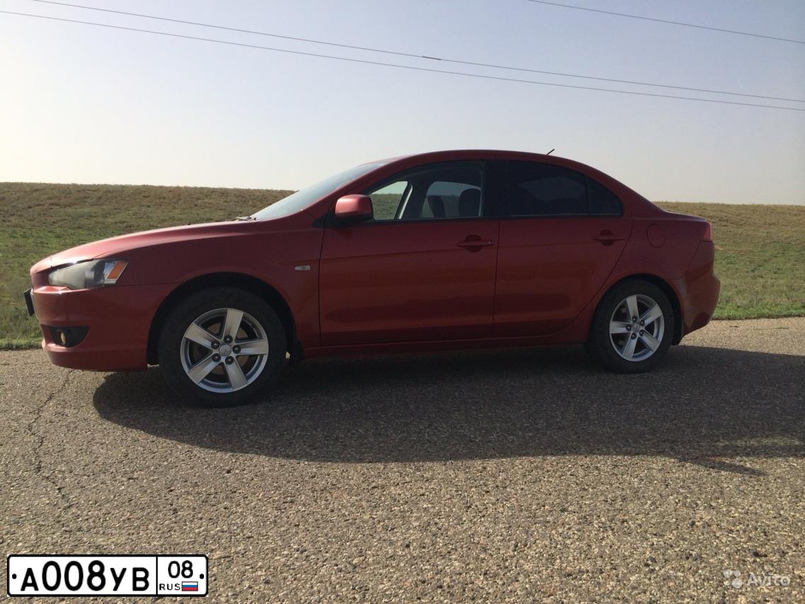 Фото автомобиля MITSUBISHI LANCER, 2007 — госномер О617ТН152. Цвет: КРАСНЫЙ