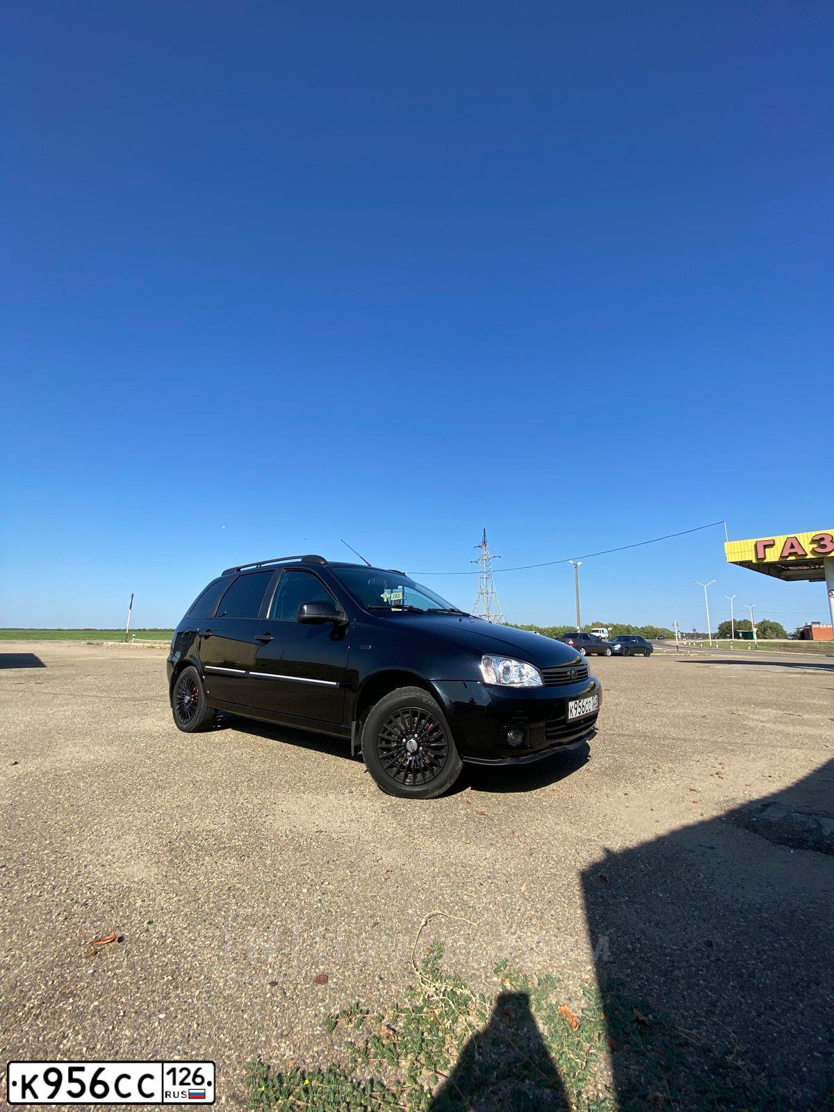 Фото автомобиля LADA 1117 KALINA, 2013 — госномер К956СС126. Цвет: СИНЕ-ЧЕРНЫЙ
