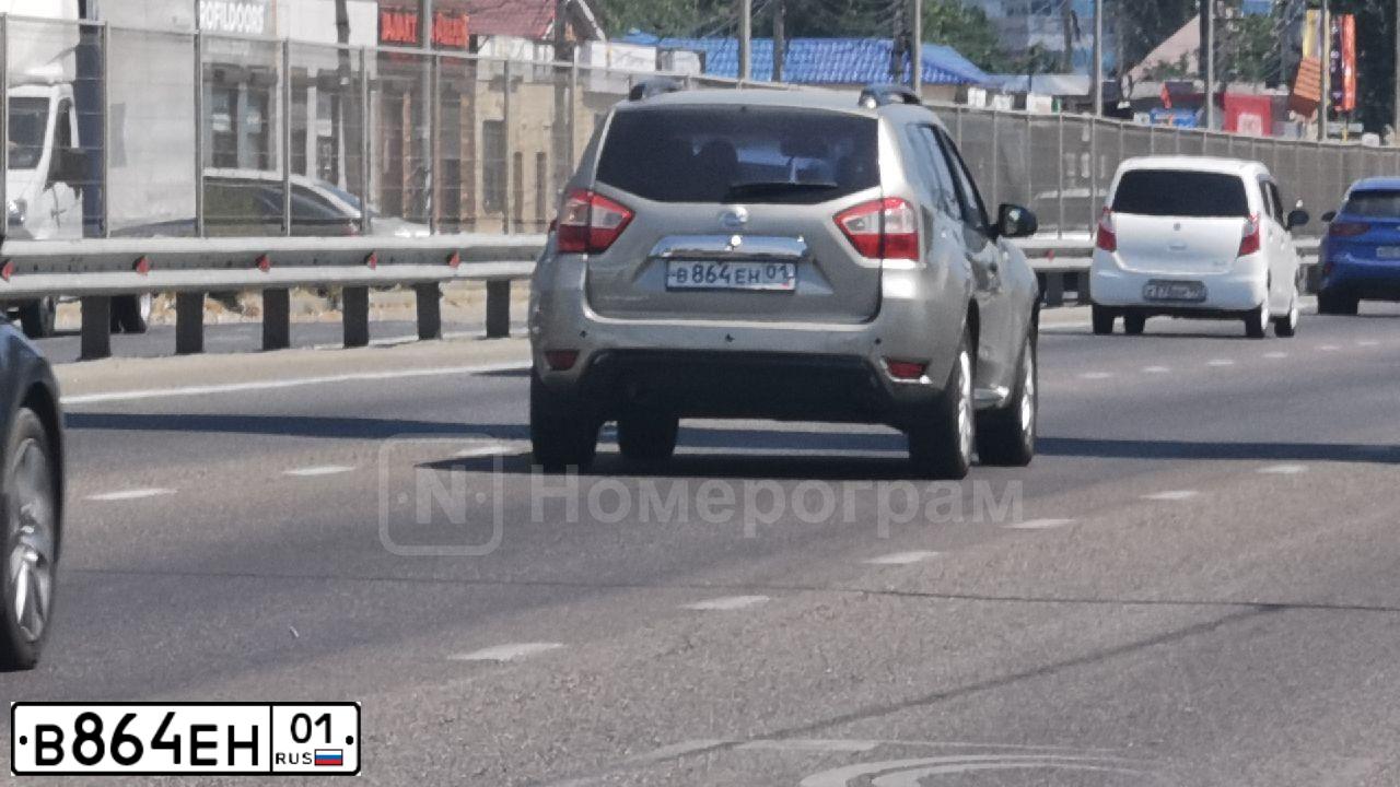 Фото автомобиля NISSAN TERRANO, 2014 — госномер А688КН164. Цвет: СЕРО БЕЖЕВЫЙ