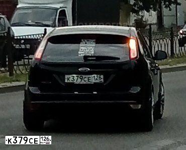 Фото автомобиля FORD FOCUS, 2009 — госномер К379СЕ126. Цвет: ЧЕРНЫЙ