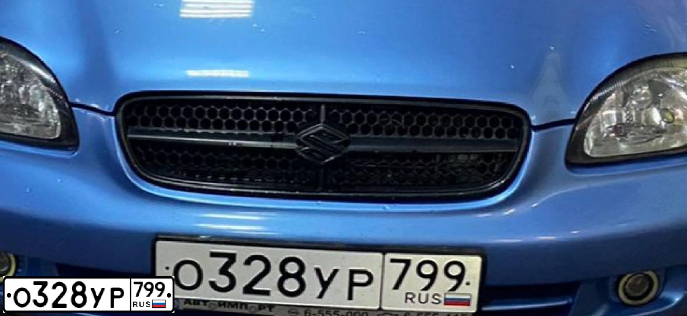 Фото автомобиля СУЗУКИ БАЛЕНО, 1999 — госномер В693РР799. Цвет: ГОЛУБОЙ