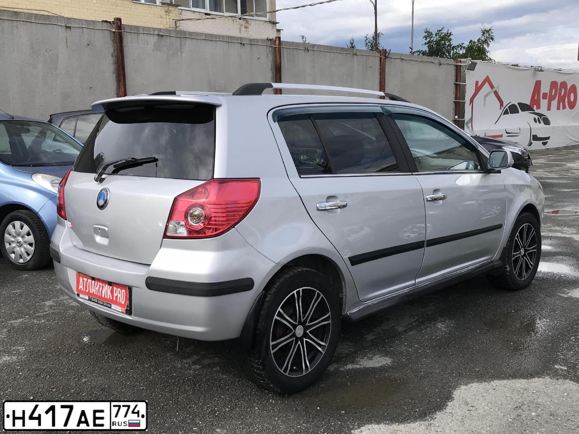 Фото автомобиля GEELY MK CROSS, 2014 — госномер Х074КМ72. Цвет: СЕРЕБРО