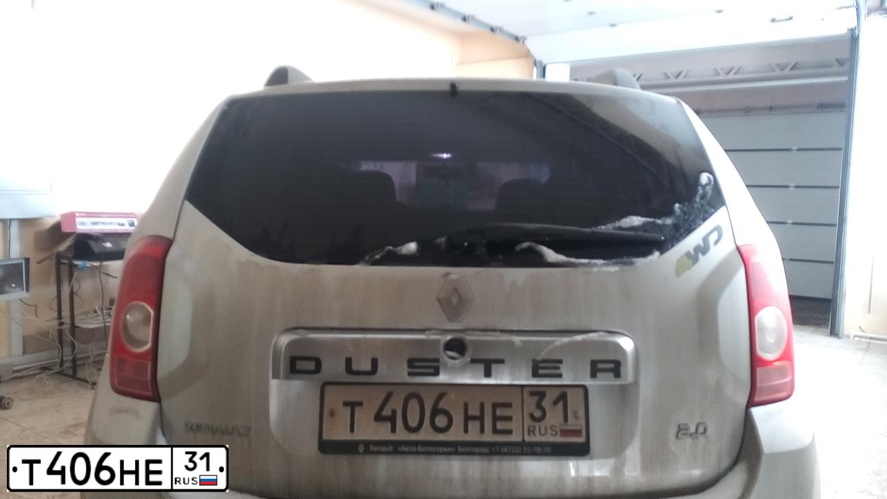 Фото автомобиля RENAULT DUSTER, 2013 — госномер Т406НЕ31. Цвет: СВЕТЛО-СЕРЫЙ