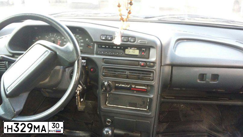 Фото автомобиля LADA 2115 SAMARA, 2008 — госномер Н329МА30. Цвет: ЧЕРНЫЙ МЕТАЛЛИК