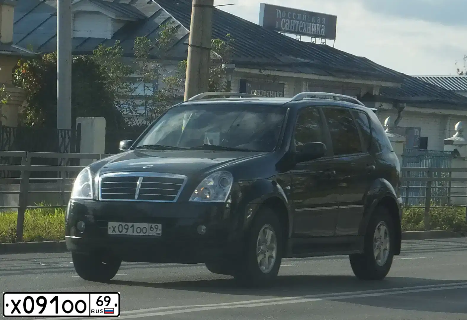 Фото автомобиля SSANGYONG REXTON, 2011 — госномер Х091ОО69. Цвет: ЧЕРНЫЙ