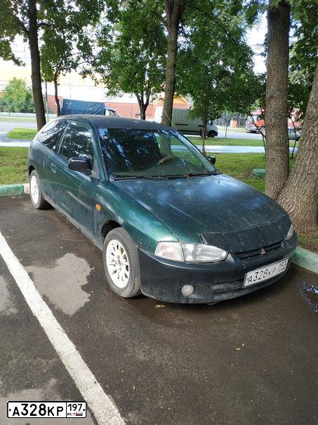 Фото автомобиля MITSUBISHI COLT, 1996 — госномер А328КР197. Цвет: ЗЕЛЕНЫЙ