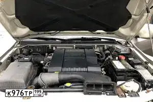 Фото автомобиля MITSUBISHI PAJERO, 2004 — госномер О599ОВ97. Цвет: БЕЖЕВЫЙ
