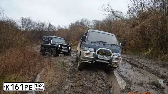 Фото автомобиля UAZ 3151 / HUNTER, 1995 — госномер К161РЕ152. Цвет: Темно-зеленый