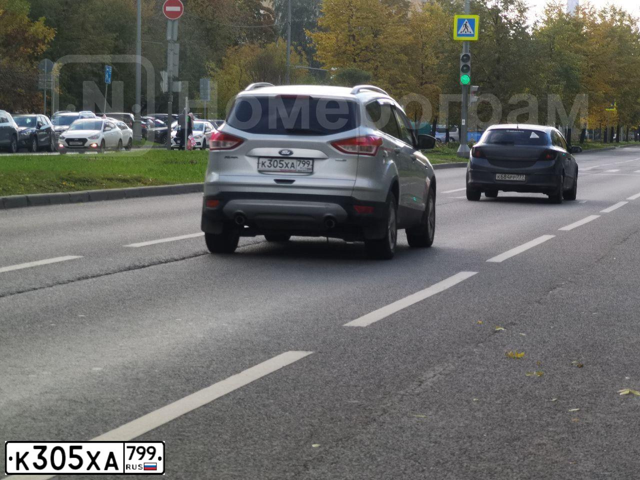 Фото автомобиля FORD KUGA, 2014 — госномер К305ХА799. Цвет: СЕРЕБРИСТЫЙ