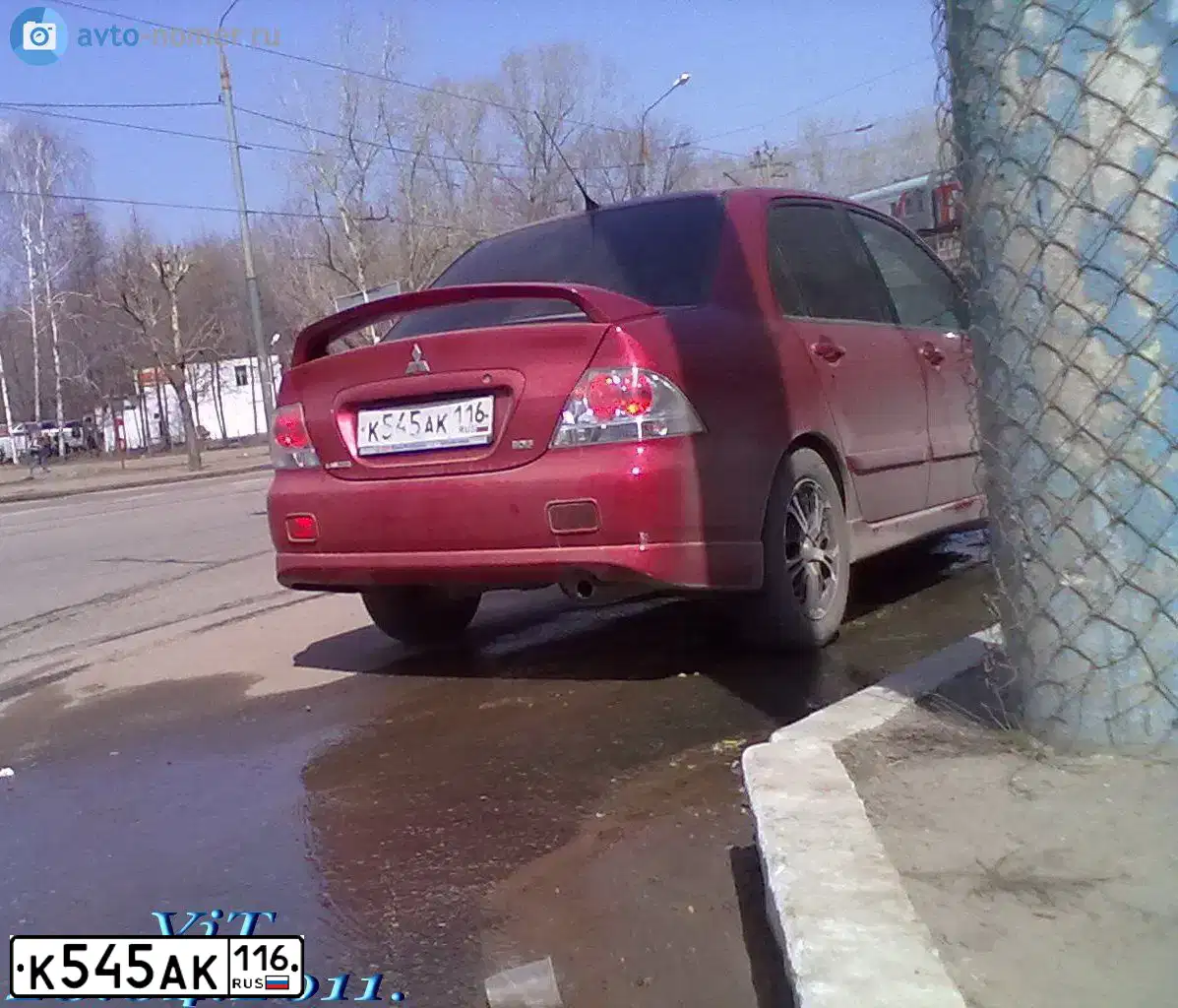 Фото автомобиля MITSUBISHI LANCER, 2006 — госномер К545АК116. Цвет: Красный