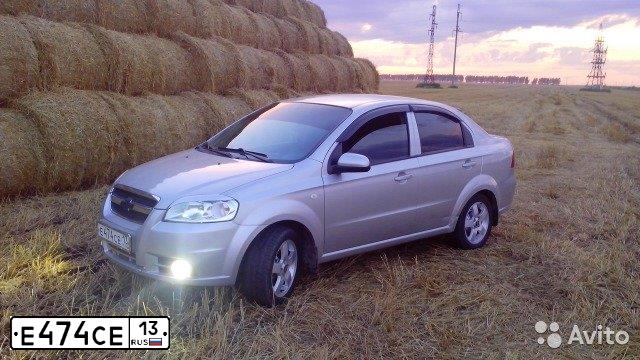 Фото автомобиля CHEVROLET AVEO, 2007 — госномер Е474СЕ13. Цвет: Серебристый