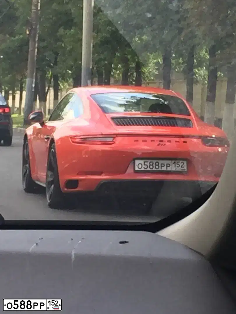 Фото автомобиля PORSCHE E 911, 2017 — госномер Х432АВ185. Цвет: ОРАНЖЕВЫЙ