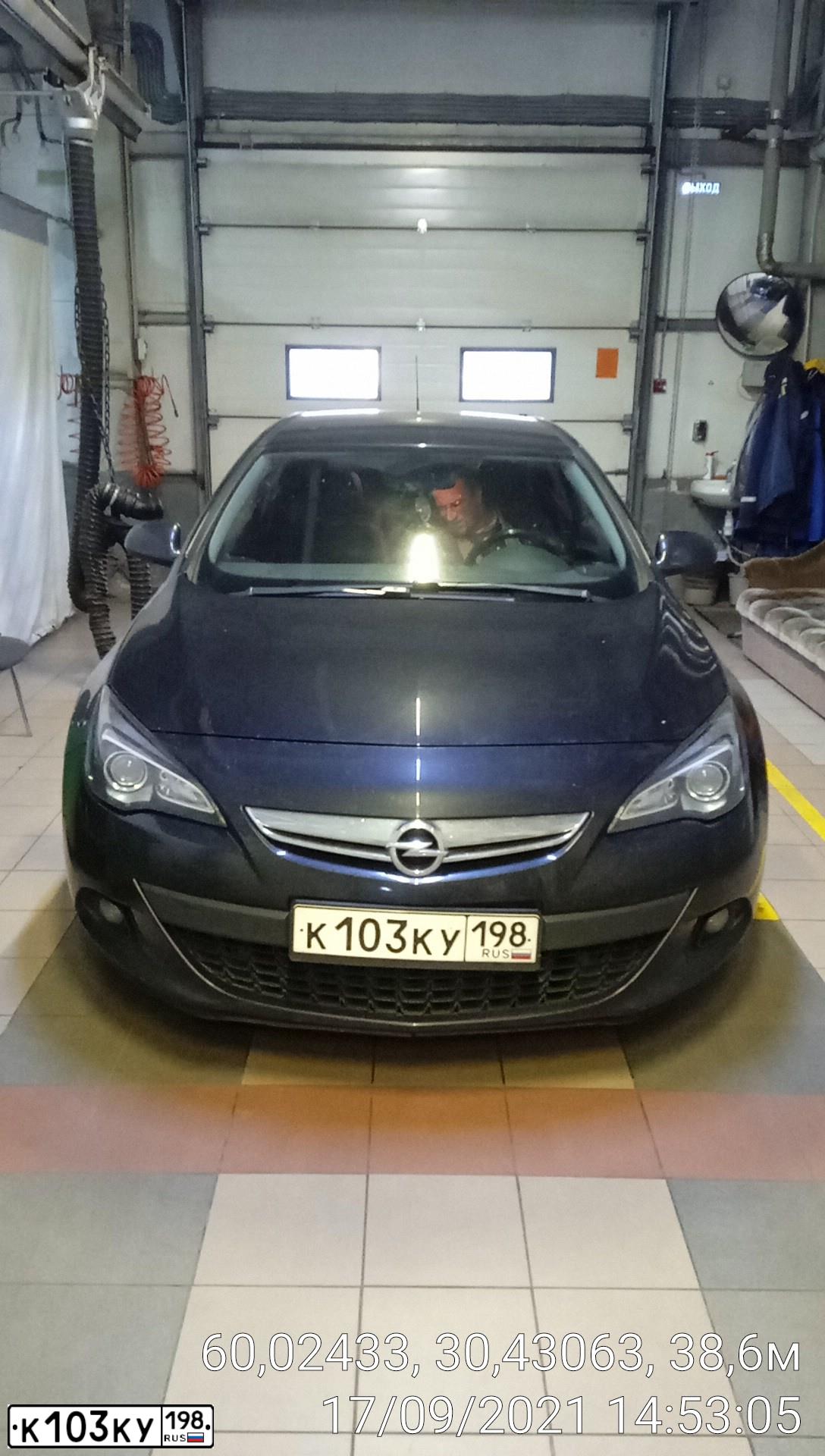 Фото автомобиля OPEL ASTRA, 2013 — госномер К103КУ198. Цвет: ЧЕРНЫЙ