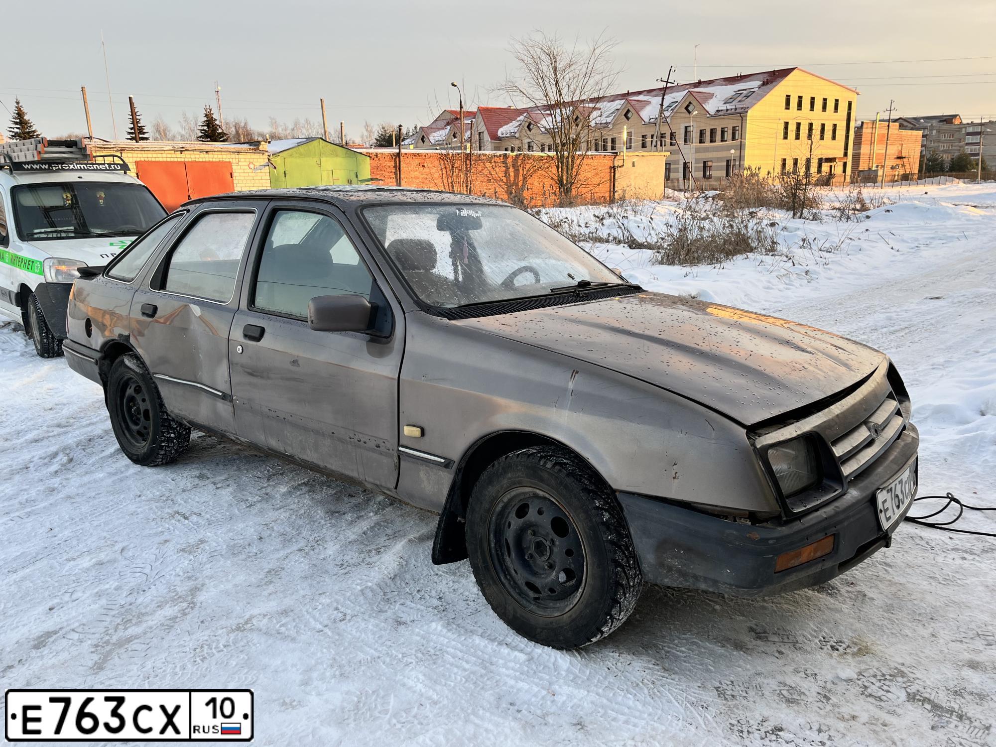 Фото автомобиля FORD SIERRA, 1986 — госномер Е763СХ10. Цвет: КОРИЧНЕВЫЙ МЕТАЛЛИК
