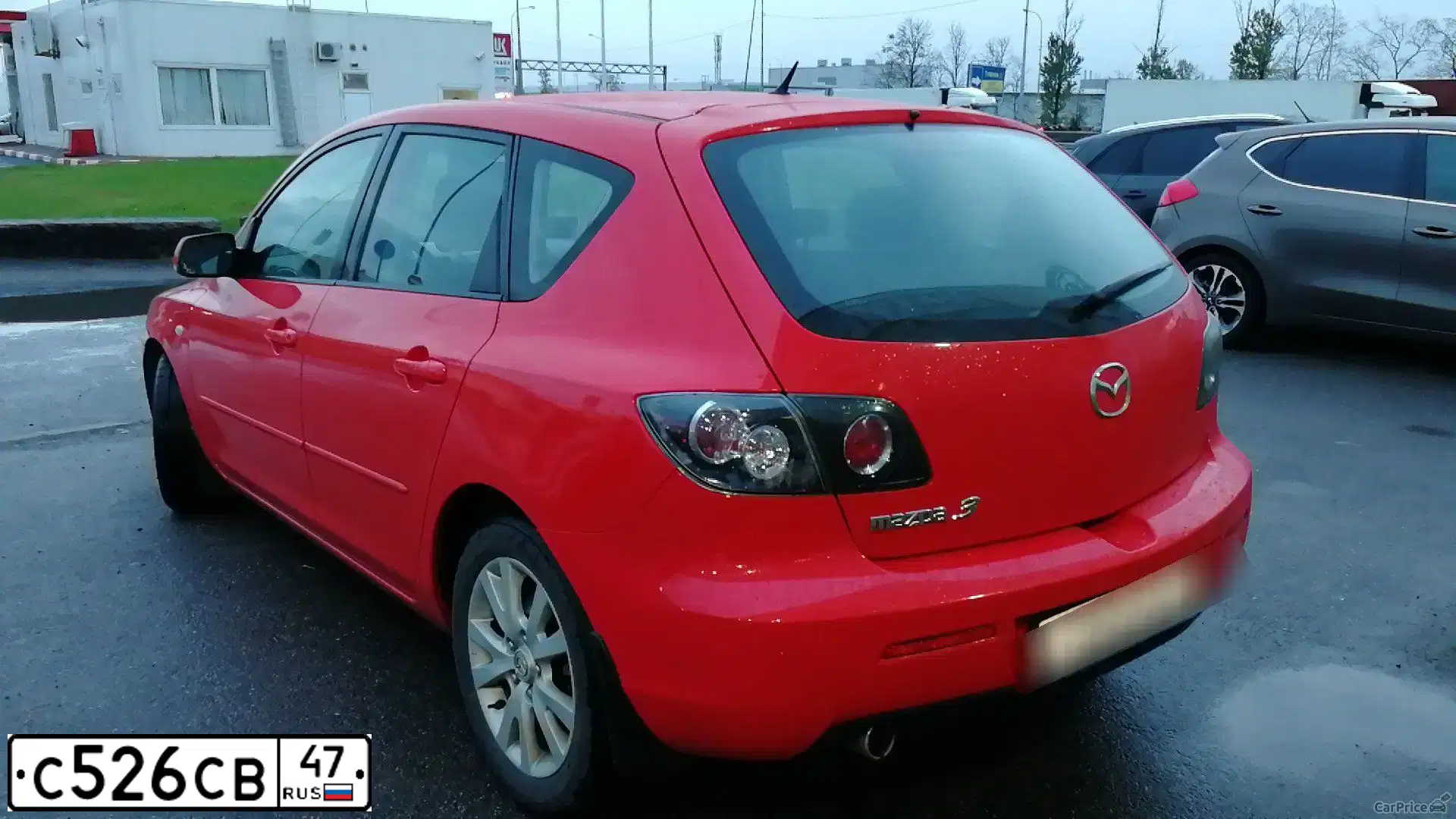 Фото автомобиля MAZDA 3, 2007 — госномер М768СК21. Цвет: Красный