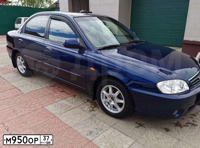 Фото автомобиля KIA SPECTRA, 2008 — госномер В131ХХ37. Цвет: Темно-синий