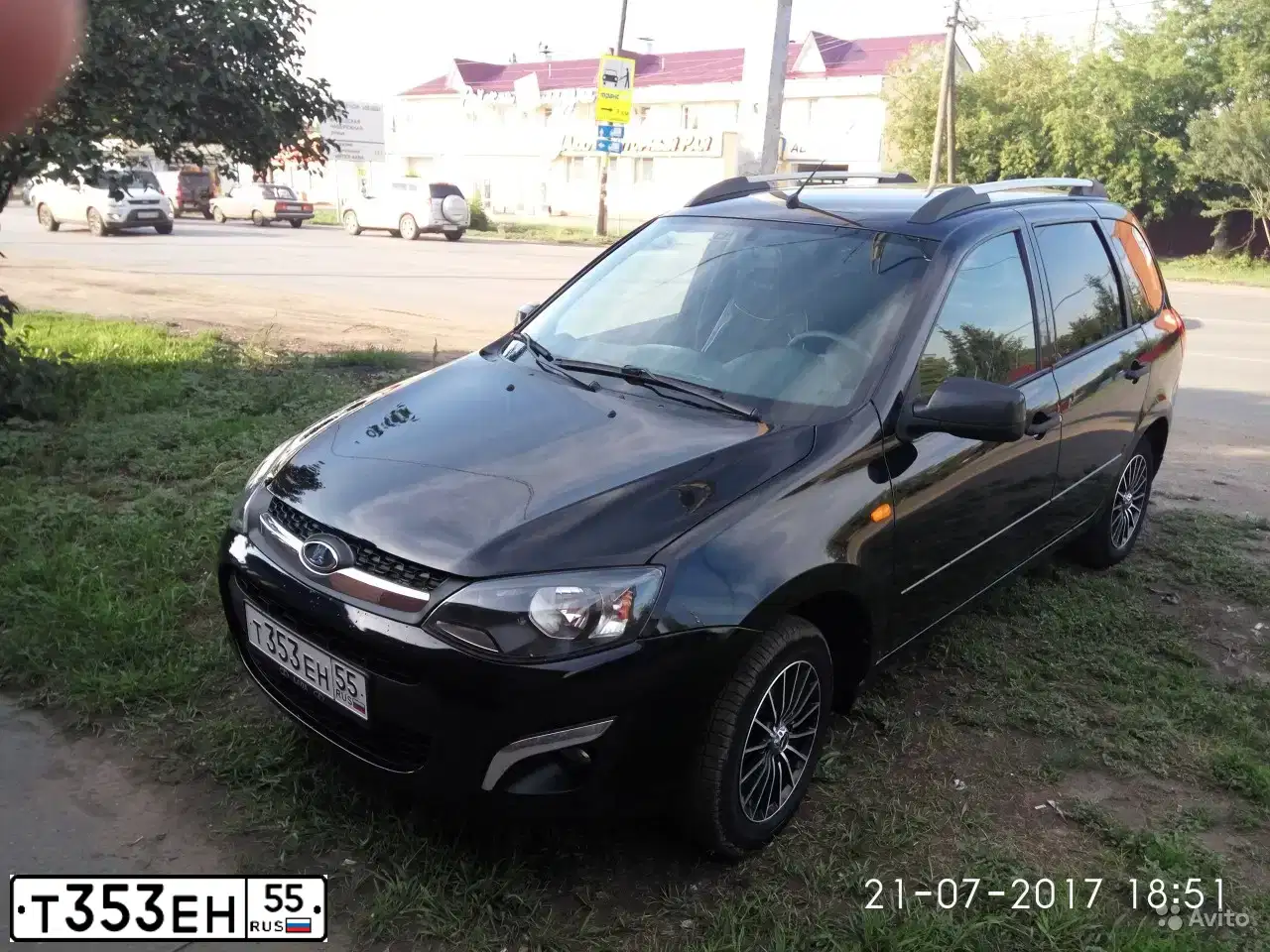 Фото автомобиля LADA 2194 KALINA, 2014 — госномер Т353ЕН55. Цвет: Сине-Черный
