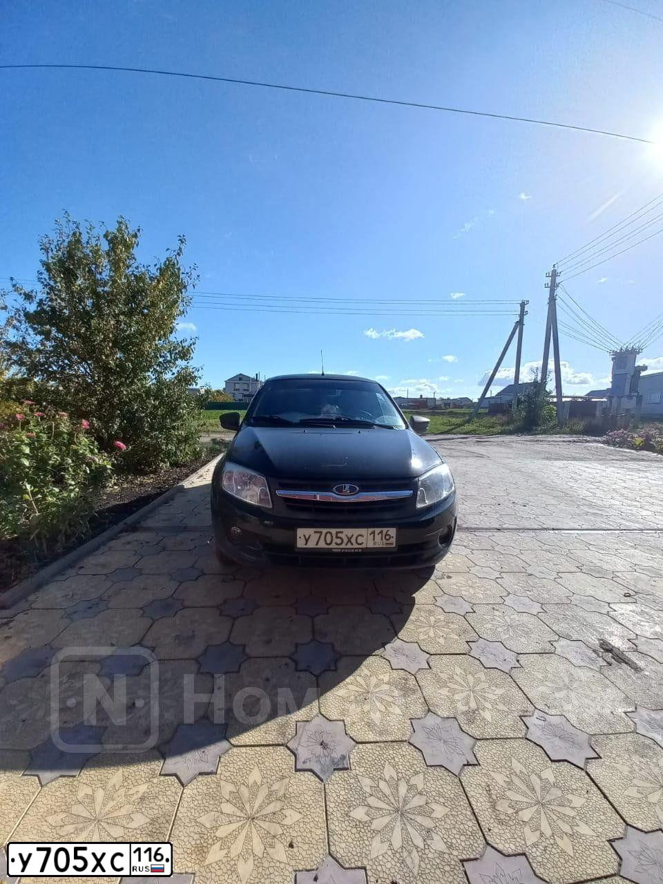 Фото автомобиля LADA 2190 GRANTA, 2015 — госномер У705ХС116. Цвет: ЧЕРНЫЙ