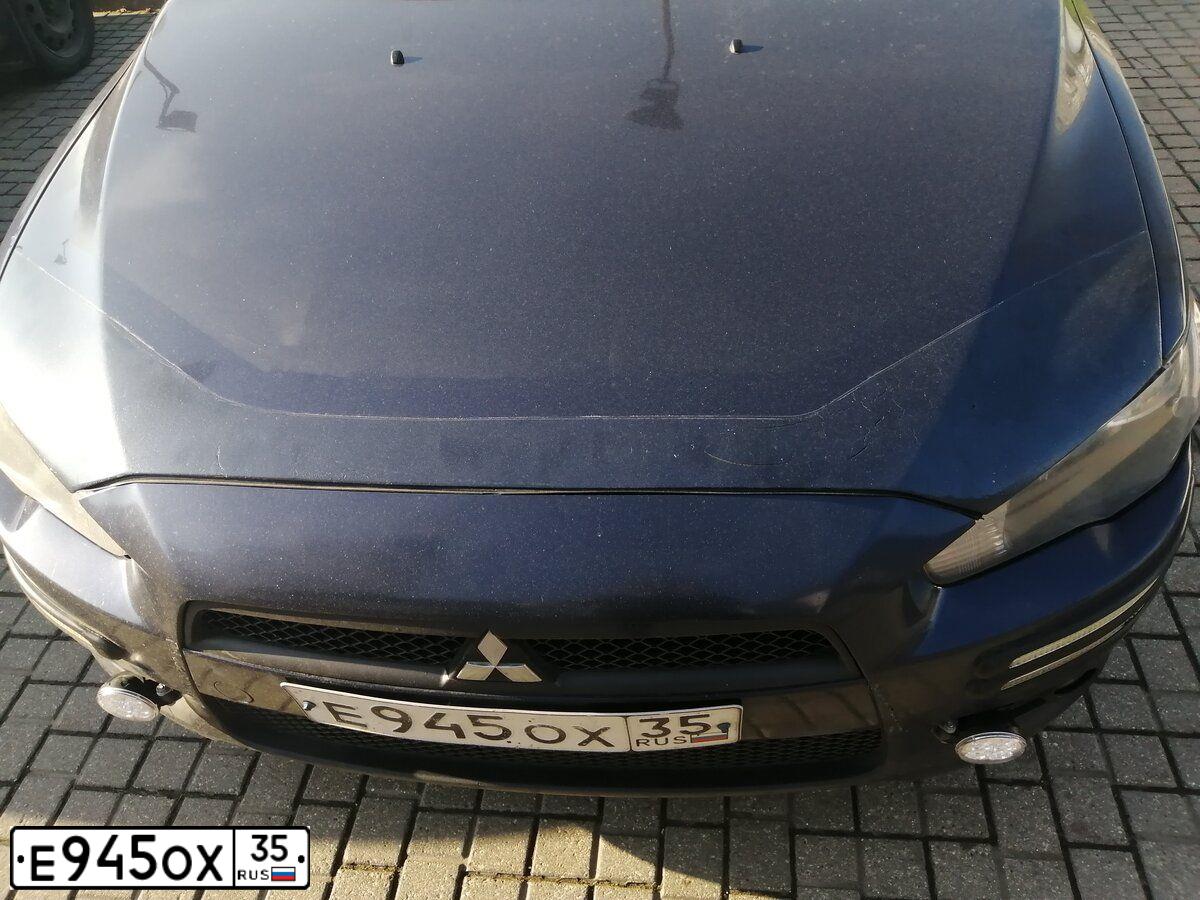 Фото автомобиля MITSUBISHI LANCER, 2008 — госномер М774СЕ82. Цвет: синий