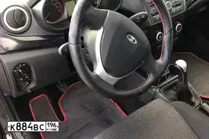 Фото автомобиля LADA KALINA, 2018 — госномер Т820КО774. Цвет: ЧЕРНЫЙ