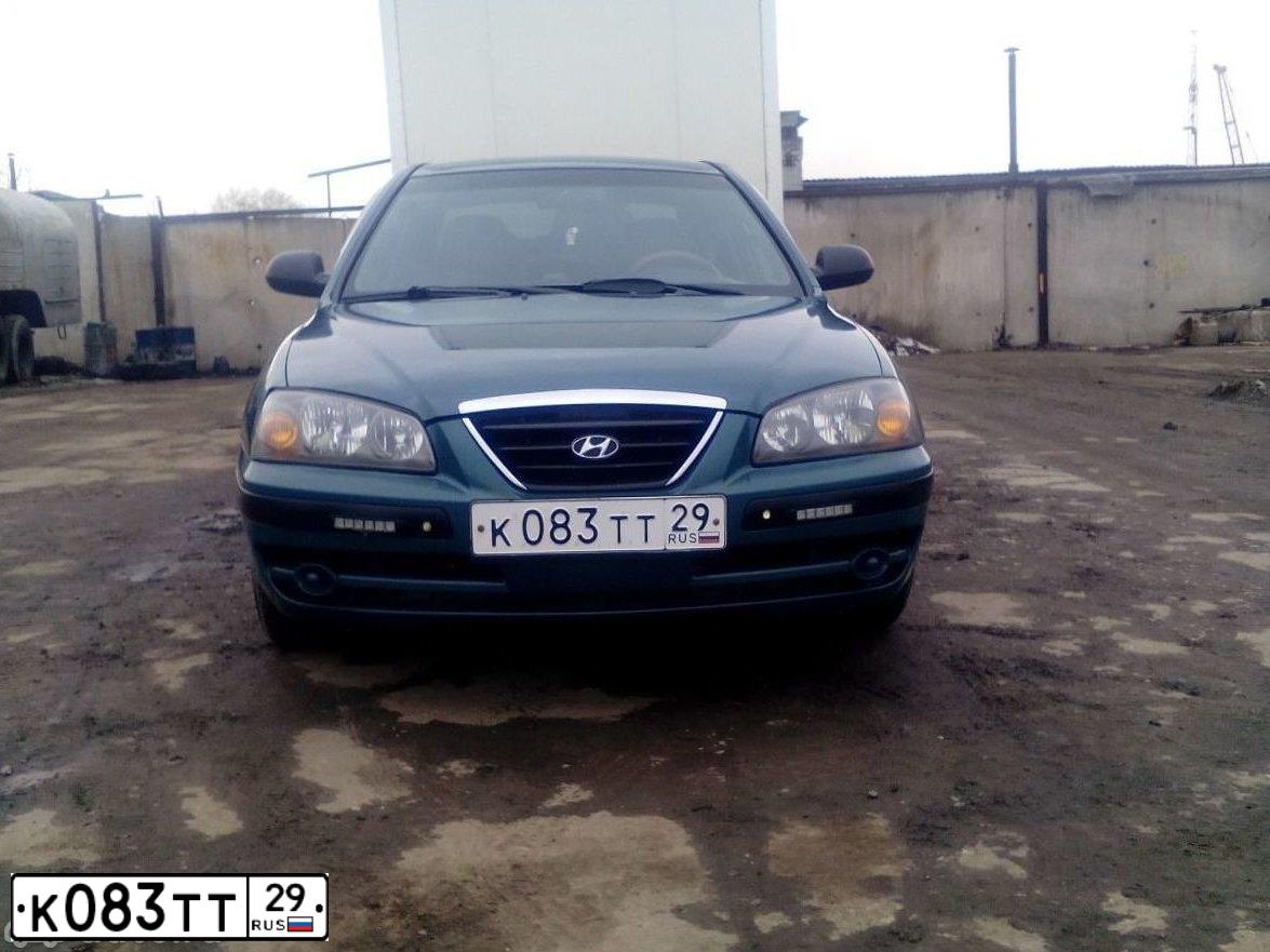 Фото автомобиля HYUNDAI ELANTRA, 2005 — госномер О054ЕТ29. Цвет: ЗЕЛЕНЫЙ