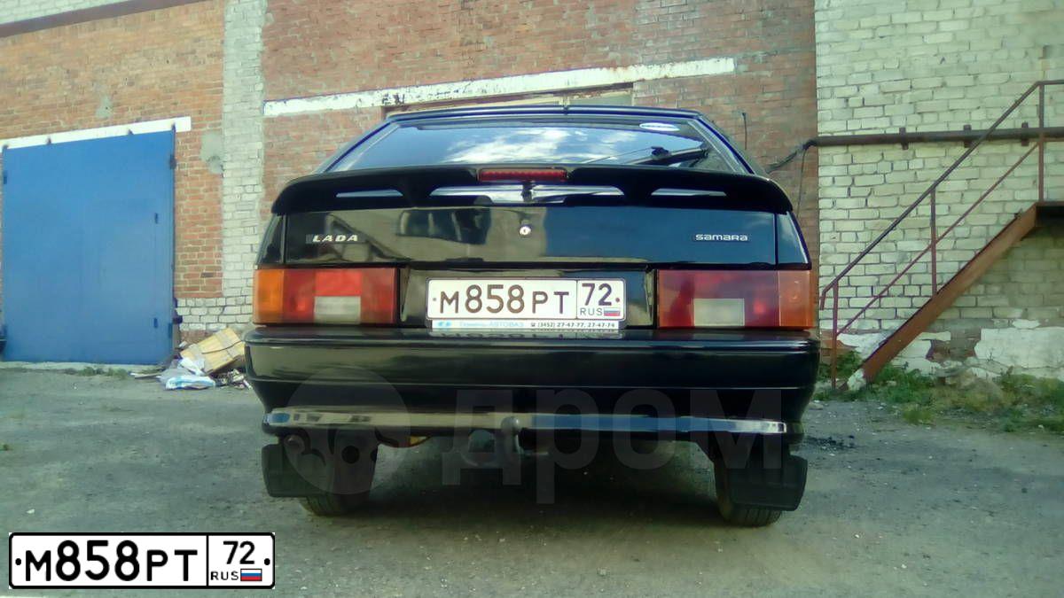 Фото автомобиля LADA 2114 SAMARA, 2009 — госномер М858РТ72. Цвет: Сине-Черный