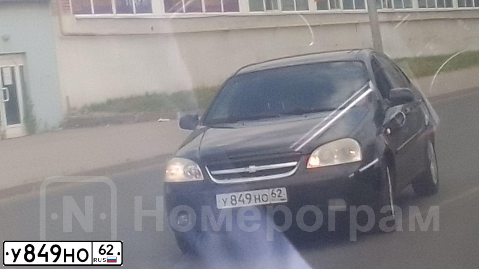 Фото автомобиля CHEVROLET LACETTI, 2008 — госномер С614УК62. Цвет: ЧЕРНЫЙ