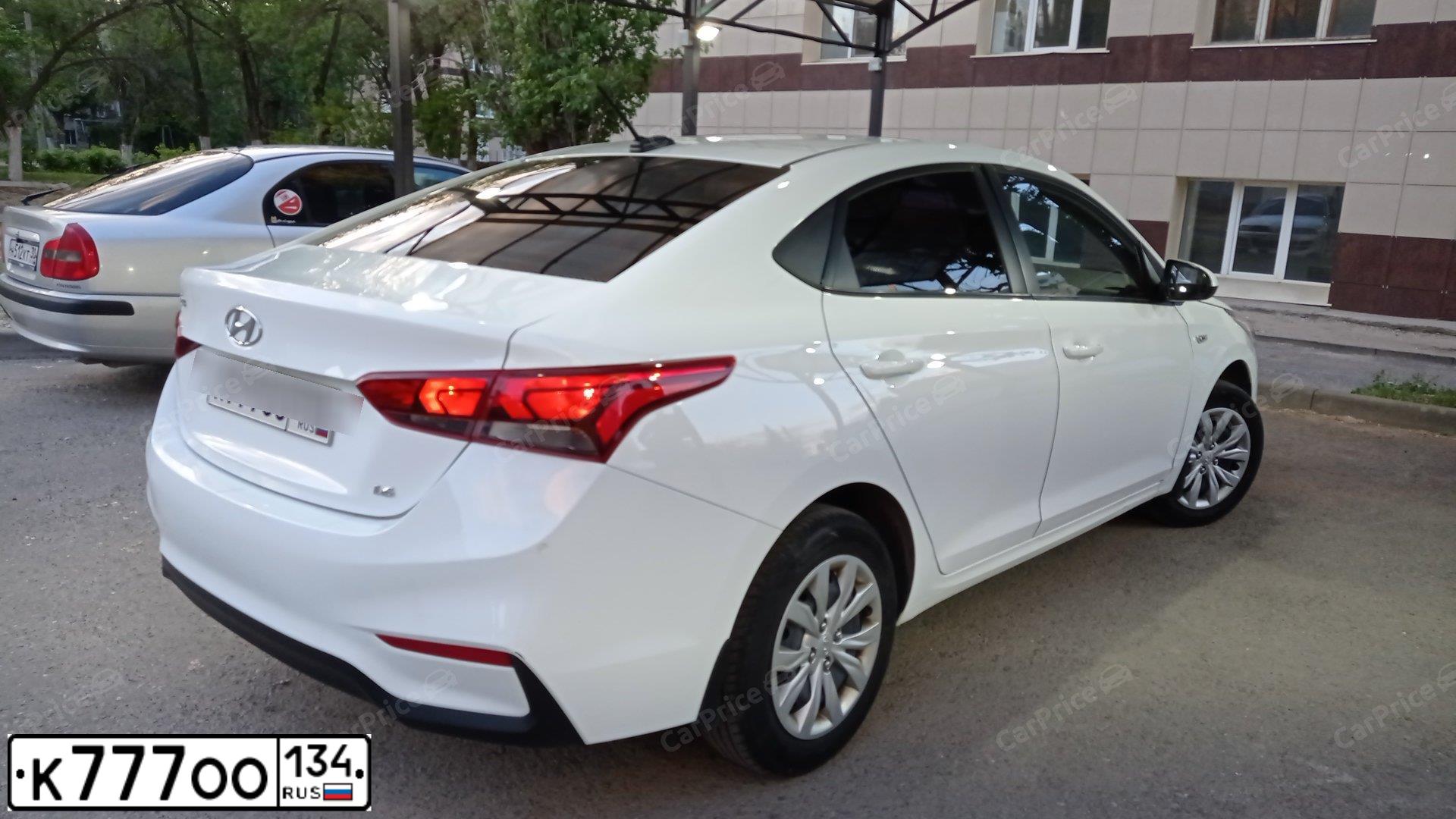 Фото автомобиля HYUNDAI SOLARIS, 2018 — госномер К777ОО134. Цвет: Белый