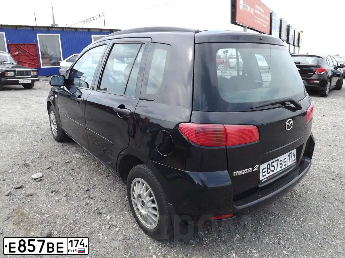 Фото автомобиля MAZDA 2, 2003 — госномер С155ВО774. Цвет: ЧЕРНЫЙ