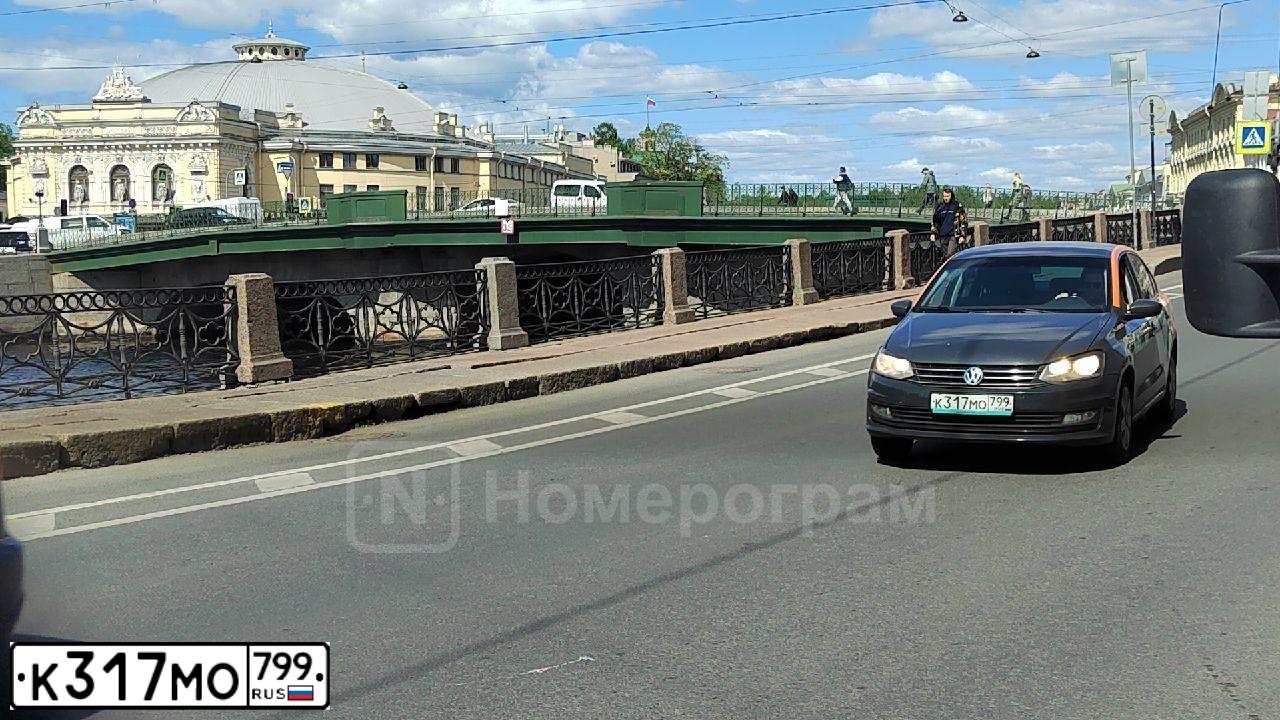 Фото автомобиля VOLKSWAGEN POLO, 2018 — госномер К317МО799. Цвет: Серый