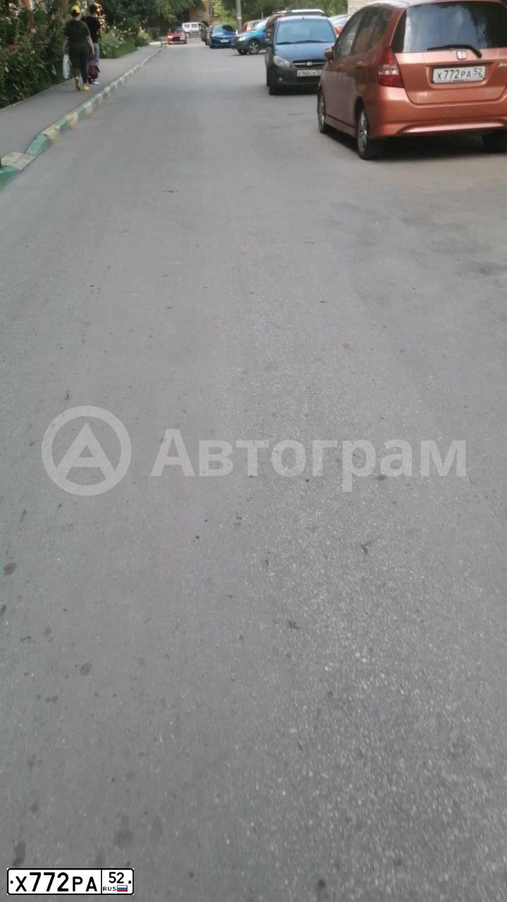 Фото автомобиля HONDA JAZZ, 2008 — госномер Х772РА52. Цвет: ОРАНЖЕВО-КОРИЧНЕВЫЙ