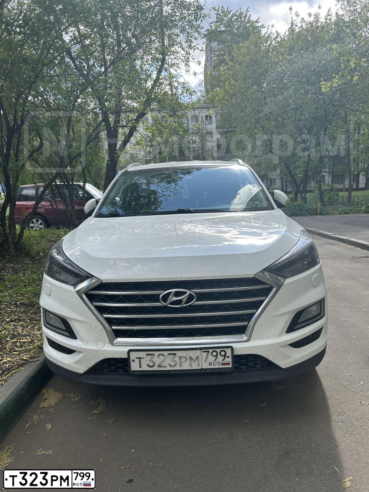 Фото автомобиля HYUNDAI TUCSON, 2019 — госномер Т323РМ799. Цвет: БЕЛЫЙ