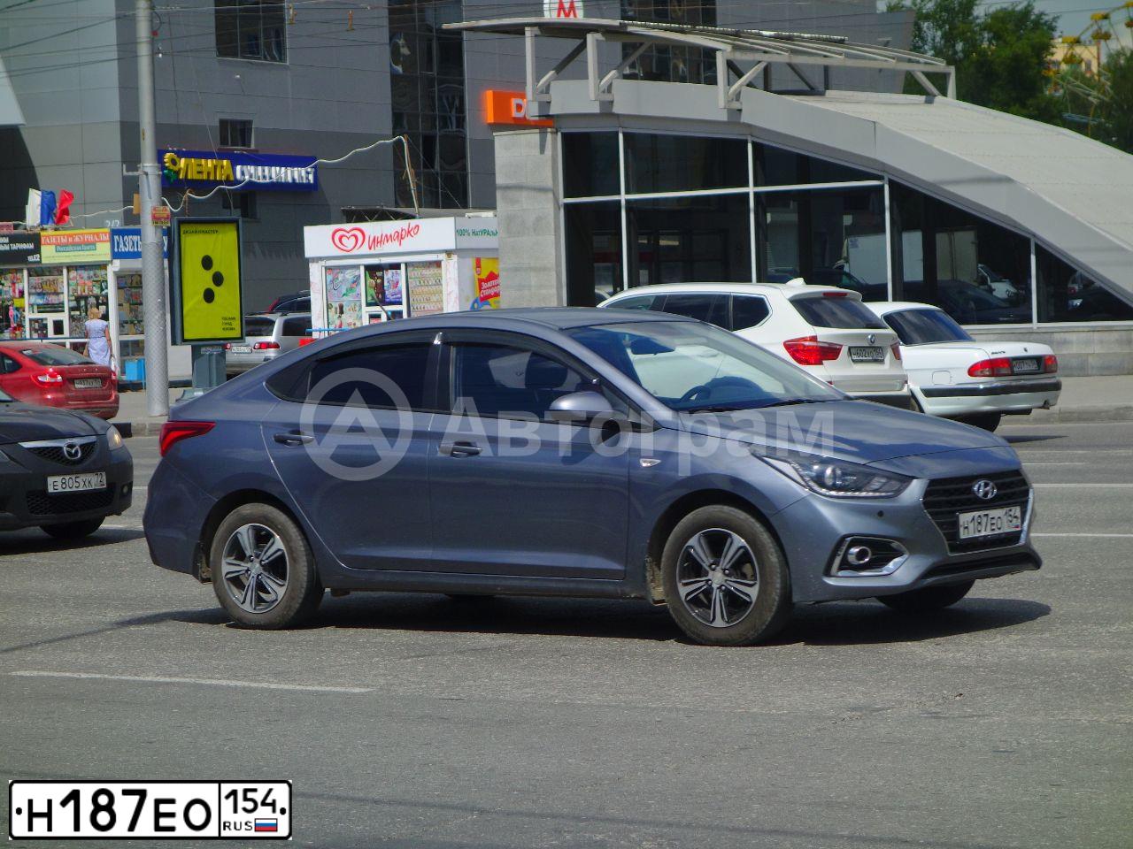 Фото автомобиля HYUNDAI SOLARIS, 2018 — госномер Н187ЕО154. Цвет: Серый