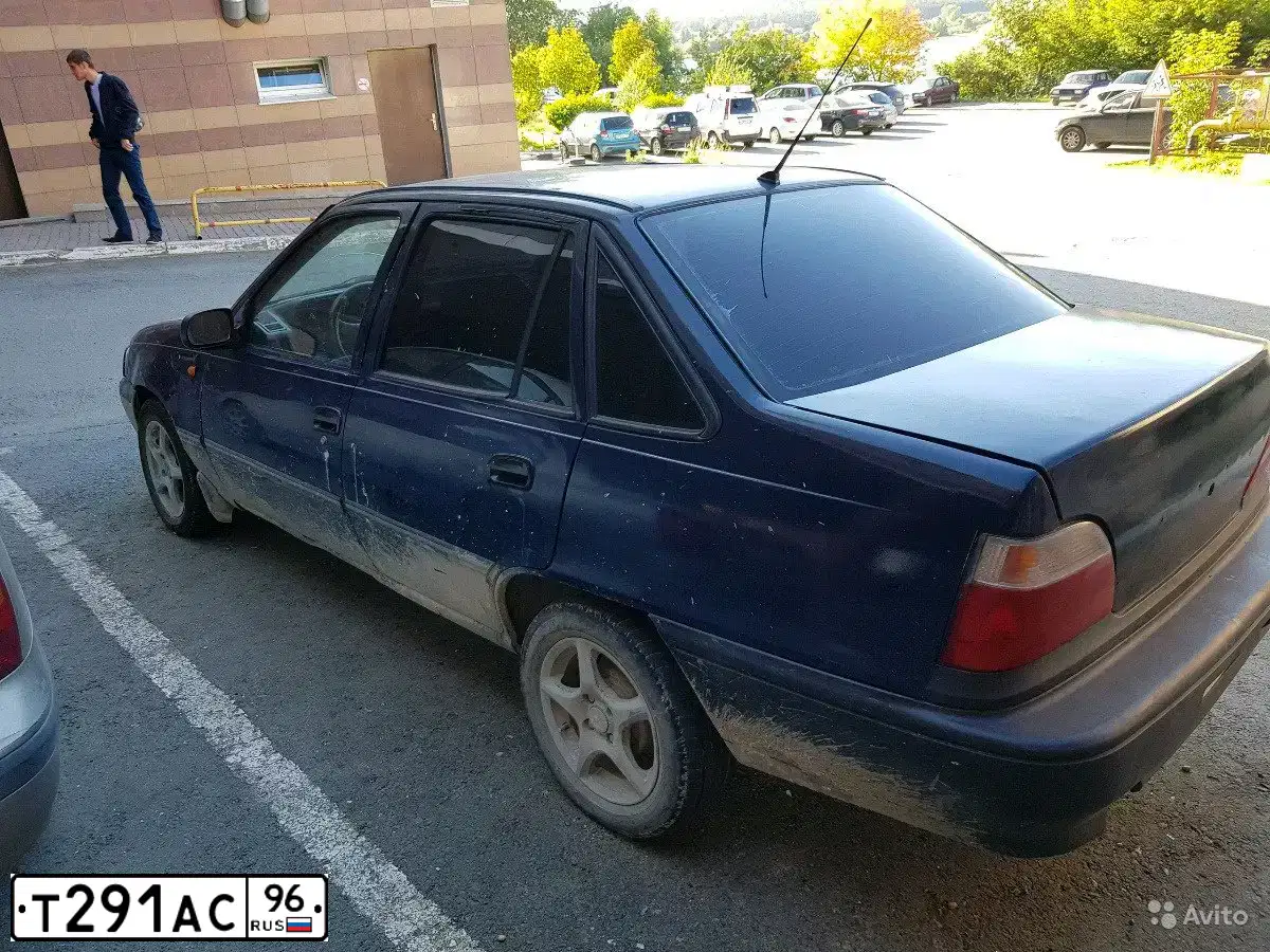 Фото автомобиля DAEWOO NEXIA, 2006 — госномер Е414УТ96. Цвет: ТЕМНО СИНИЙ