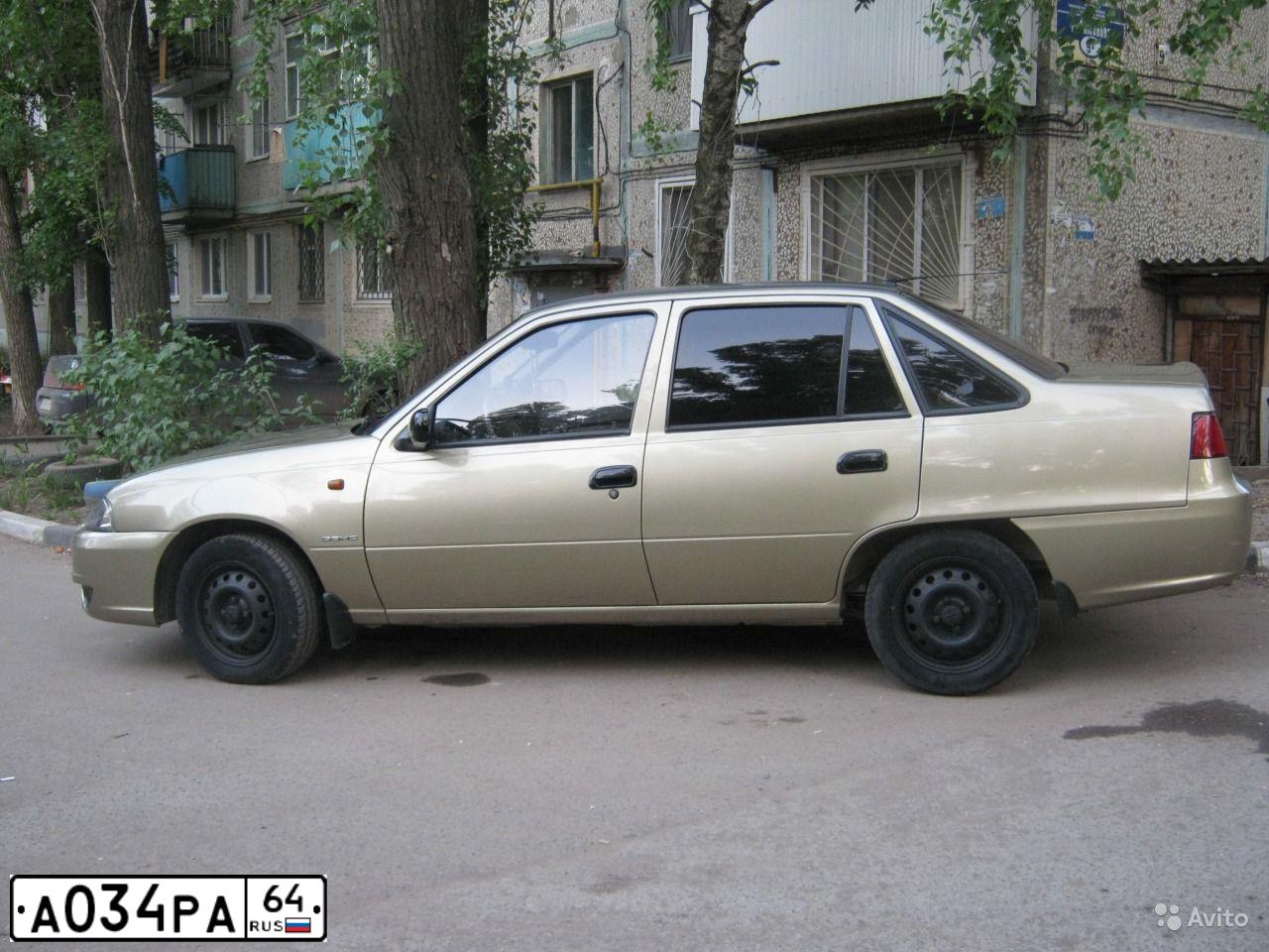 Фото автомобиля AZLK 21412 M 214122, 1995 — госномер А034РА64. Цвет: Красный