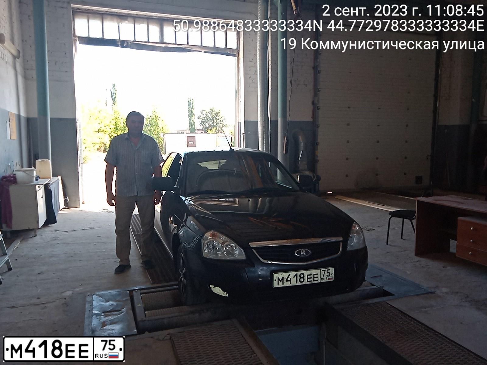 Фото автомобиля LADA 217030 LADA PRIORA, 2013 — госномер Н140ОК134. Цвет: СИНЕ-ЧЕРНЫЙ