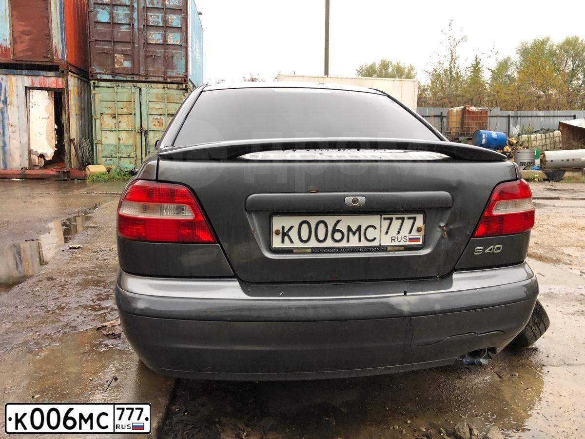 Фото автомобиля ВОЛЬВО S40, 2003 — госномер М704ТН199. Цвет: ТЕМНО-СЕРЫЙ