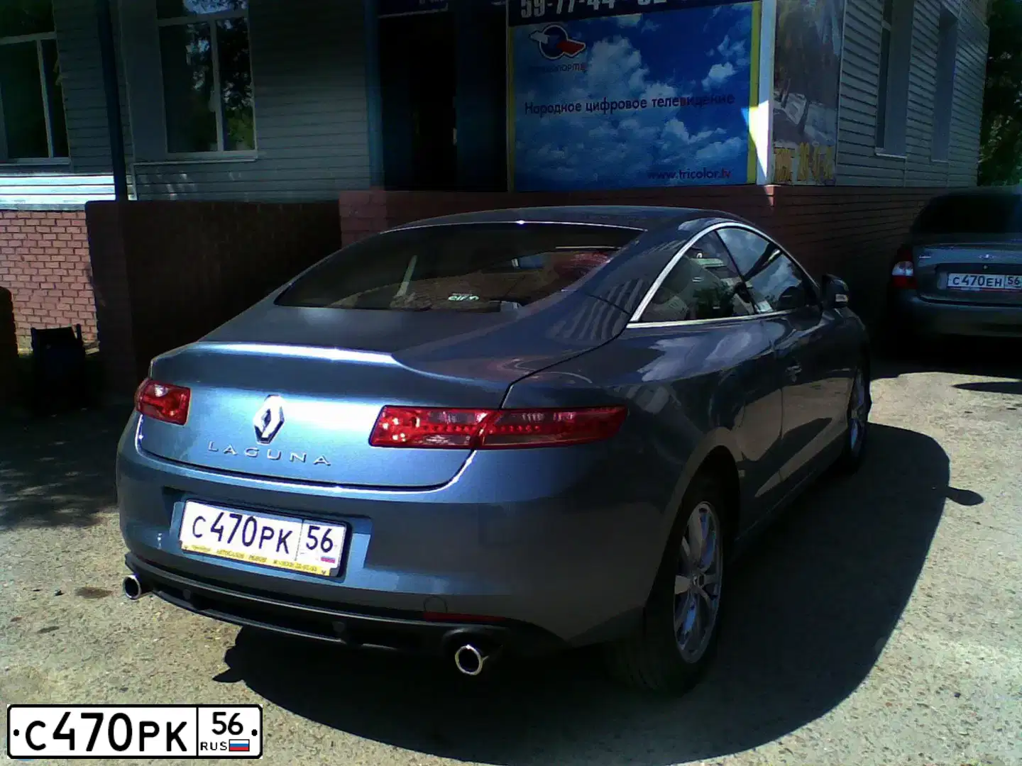 Фото автомобиля RENAULT LAGUNA, 2009 — госномер М777ХТ56. Цвет: голубой