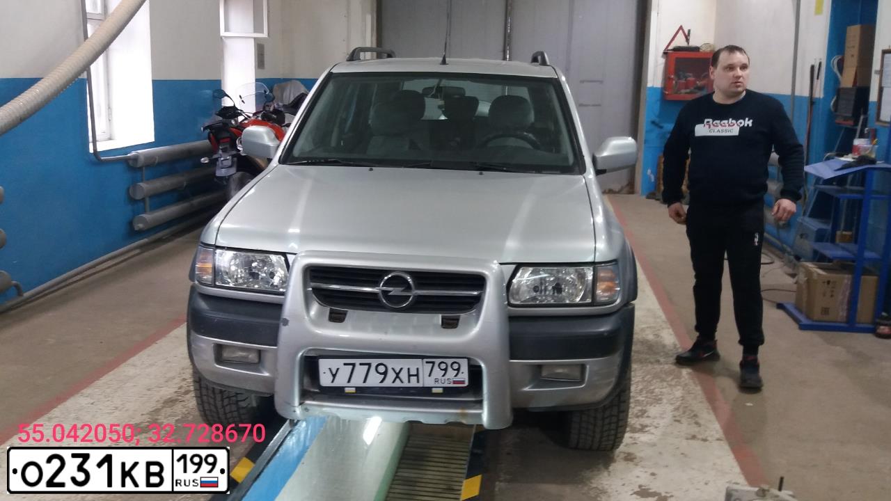 Фото автомобиля OPEL FRONTERA, 2003 — госномер М157ОО67. Цвет: Серый