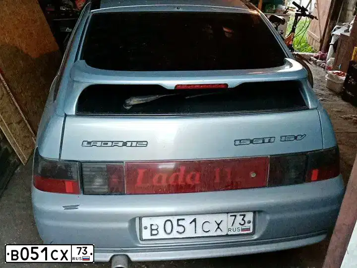 Фото автомобиля LADA 2112 LADA, 2004 — госномер В051СХ73. Цвет: ЖЕЛТЫЙ
