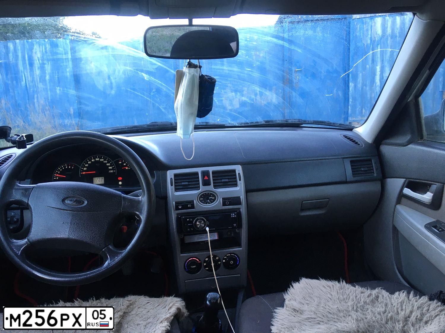 Фото автомобиля LADA 2170 PRIORA, 2009 — госномер Е145ЕР164. Цвет: Белый