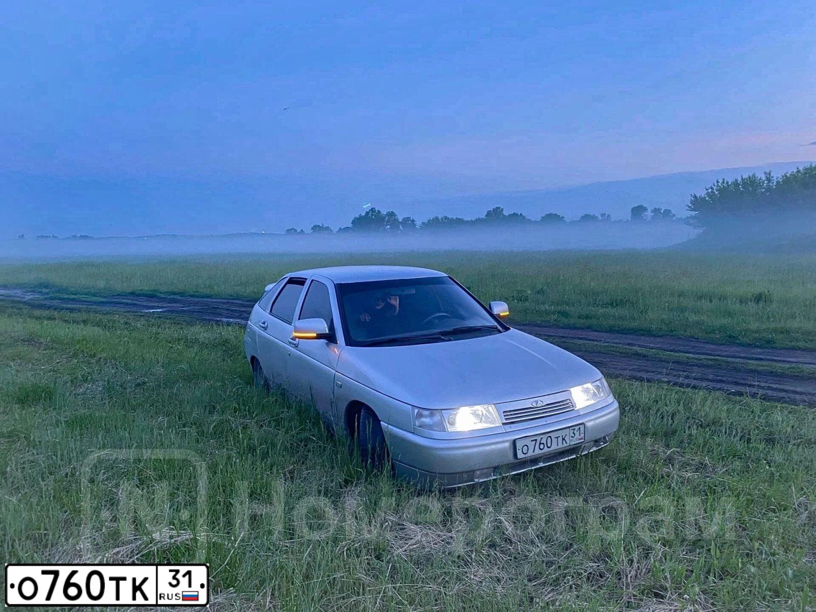 Фото автомобиля LADA 2112, 2005 — госномер О760ТК31. Цвет: серебристый