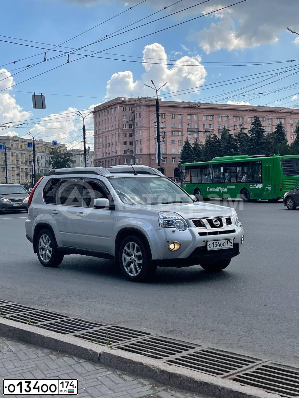 Фото автомобиля NISSAN X-TRAIL, 2014 — госномер О134ОО174. Цвет: Серебристый